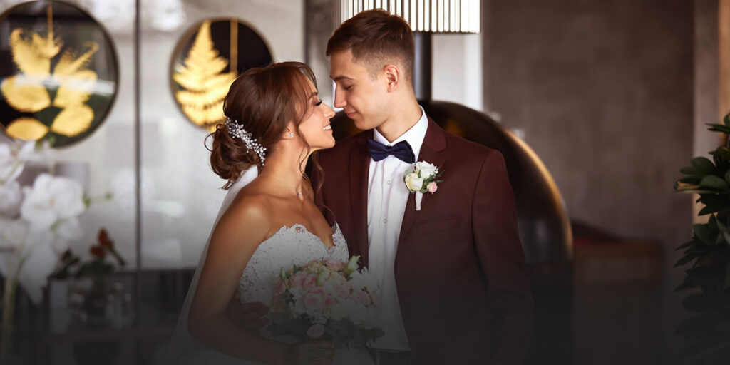 married couple embracing after luxy hotel wedding