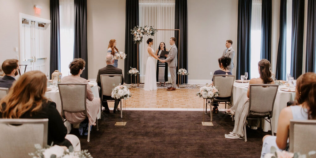 couple at the altar before a wedding